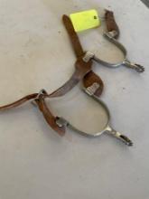 Spurs, steel & brass with leather straps. 1 pair