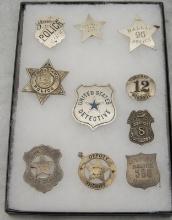 Framed Showcase collection of 10 Badges to include: (1) Special Police Shield Badge, 2 1/8" x 1 3/4"