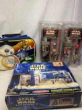 3 Star Wars episode 1 collectibles being: a C-3PO and Darth Maul collectors watch with a lightsaber