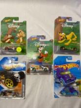 3 assorted Disney themed Hot Wheels collectibles with 2 assorted Hot Wheels
