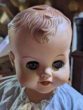 (GAR) Rubber Baby Doll with Silver Eyes Wearing a White Dress with a Blue Shawl, Approximately 19"