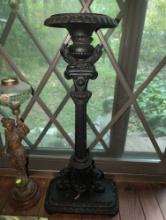 (DEN) VINTAGE CAST IRON NEOCLASSICAL CANDLE STICK STAND WITH DRAGON/BEAST DETAILING AT THE BASE. IT