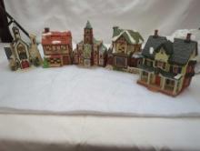 CHRISTMAS VILLAGE BUILDINGS WITH STRING OF LIGHTS. CHURCHES, GENERAL STORE, TWO HOMES.