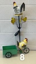 SOLAR CHICKEN YARD STAND AND METAL CHICKEN PULLING WAGON, THESE ARE NEW SUR