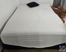 Full size bed with mattress, boxspring, and frame