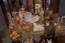 SHELF LOT INCLUDING MINIATURE COLLECTIBLES INCLUDING CLOCKS CANDLE HOLDERS