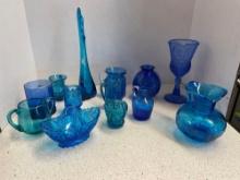 Blue glassware lot, including a swung vase