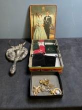 Ornate handheld mirror, queen tin, Tiara, some jewelry