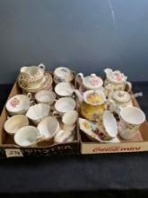 Teacups, saucers, and teapots