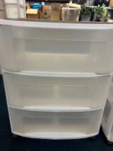 2 plastics storage bins cabinets on wheels