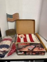 American flags one new in box, Tetley tea tin, two-way radio, more