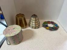 antique lampshades and multicolor glass decoration