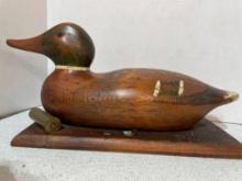 Wood duck decoy and Dansk cheese board and knife