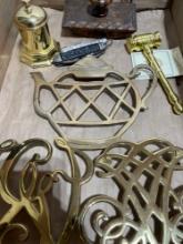 breast trivet and miscellaneous brass pieces, two pocket knives, teacup, and more