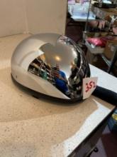 Chrome, painted motorcycle helmet