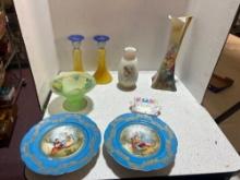 large flower ceramic pitcher, yellow to blue candle holders, blue scene pedestal plates and green