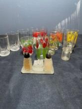 juice glasses, salt and pepper shakers and small wall hangings