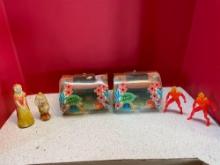 Vintage toys, including two troll houses, chalkware snow white and dwarf, two marvel torches
