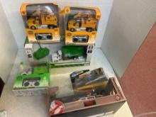 toy cars and trucks in boxes