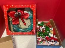 lot of wooden Christmas ornaments and wreath in box