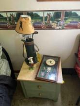 Small side dresser with golf decor items