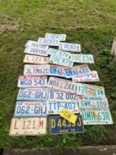 License plates from Ohio, Utah, Alabama, New York, Washington, Arkansas, and Florida