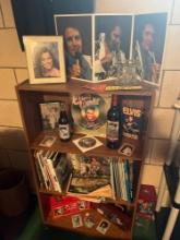 Shelf with Elvis memorabilia and books