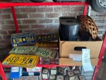assorted vintage license plates, coffee maker