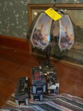 Toy cars, lamp, painting