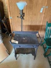 Vintage wooden side table with floor lamp